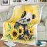 Cute baby panda with sunflowers on a yellow blanket