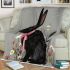 Cute black rabbit with pink collar blanket