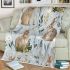 Cute bunnies and flowers on light blue blanket