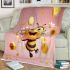 Cute cartoon bee holding flowers and a honeycomb blanket