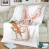 Cute cartoon rabbit holding a carrot blanket