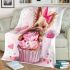 Cute cartoon yorkshire terrier inside a pink cupcake blanket