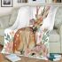 Cute deer with flowers blanket