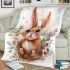 Cute happy baby bunny with big eyes sitting blanket