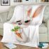 Cute happy white rabbit with big eyes holding one carrot blanket