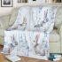 Cute pastel blue bunnies and floral pattern blanket