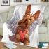 Cute valentine yorkie with angel wings holding heart blanket