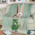 Cute white rabbit holding daisies blanket