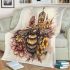 Queen bee sitting on top of honeycomb blanket