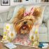 White long haired yorkshire terrier with a pink ribbon in her hair blanket