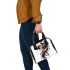 Abstract animal combining organic shapes shoulder handbag