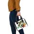 Abstract animal large abstract shapes around the creature shoulder handbag