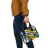 Abstract blue and yellow geometric masterpiece shoulder handbag