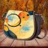 Abstract composition of circles and lines in the style saddle bag