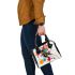 Abstract composition of colorful circles and lines shoulder handbag