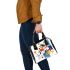 Abstract composition of houses simple shapes and lines shoulder handbag