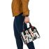 Abstract composition of simple shapes shoulder handbag