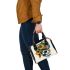 Abstract composition with geometric shapes shoulder handbag