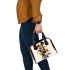 Abstract design with geometric shapes and organic forms shoulder handbag