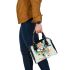 Abstract design with geometric shapes and organic forms shoulder handbag