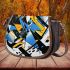 Abstract graffiti shapes in blue saddle bag