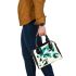 Abstract illustration of geometric shapes shoulder handbag