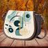 Abstract illustration of geometric shapes saddle bag