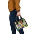 Abstract modern painting of the toucan bird shoulder handbag