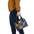 Abstract painting in the style of kandinsky with bright colors shoulder handbag