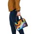 Abstract painting of colorful shapes and circles shoulder handbag