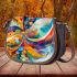 Abstract painting of colorful shapes and circles saddle bag