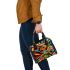 Abstract painting of fish vibrant colors geometric shoulder handbag