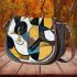 Abstract painting of guitar shapes and lines in blues saddle bag
