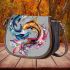 Abstract two fish in an underwater dance saddle bag
