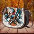 Abstract with shapes and lines in bold colors like blue saddle bag