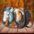 An acrylic painting of three horses close up saddle bag