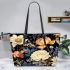 Artistic floral vase on table leather tote bag