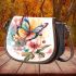 Beautiful colorful butterfly among flowers saddle bag