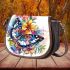 Beautiful colorful butterfly among flowers saddle bag