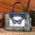 Beautiful colorful butterfly with flowers small handbag