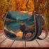 Beautiful deer standing in front of the water saddle bag