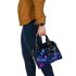 Beautiful night scene with colorful glowing butterflies shoulder handbag