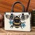 Bee with a blue flower on its back small handbag