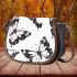 Black and white butterfly pattern with pink accents saddle bag