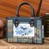 Blue butterfly and blue flowers small handbag
