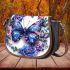 Blue butterfly surrounded by roses and flowers saddle bag