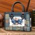 Blue butterfly surrounded by roses and flowers small handbag