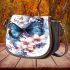 Blue butterfly with white flowers around saddle bag