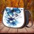Blue butterfly with white flowers around saddle bag
