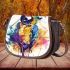 Blue macaw in the style of abstract watercolor saddle bag